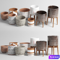 Collection of earthenware and patterned concrete vases