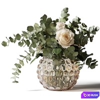 Bouquet of roses and eucalyptus in a glass pimpled vase