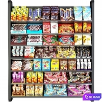 Shelf in the supermarket with sweets. Chocolate