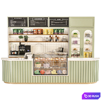 Cafe with display case with desserts and coffee machine