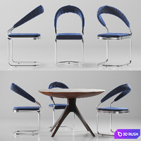 Table and chair with upholstery
